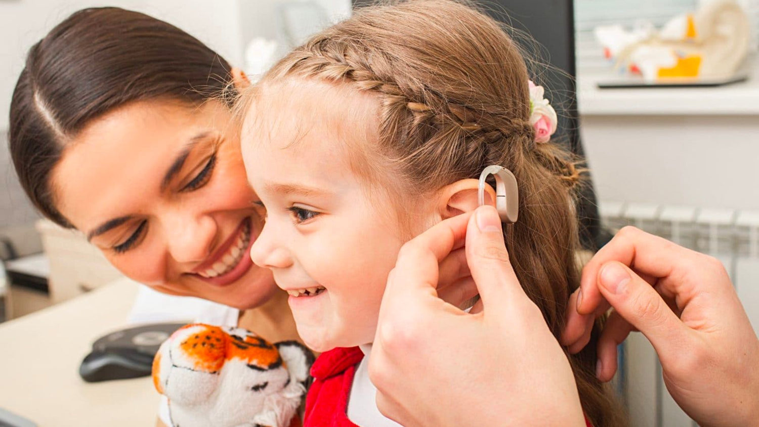 Kid fitted with Behind-The-Ear (BTE) Hearing Aids @ SOUNDLIFE Hearing Center Indonesia